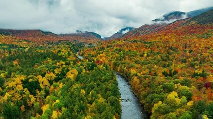 Beautiful Autumn foliage timelapsing aerial view with stunning nature colors from Adirondack upper New York State, USA