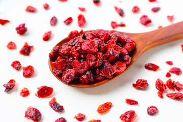 Dried cranberries piled on a white background
