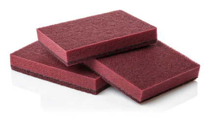 Three maroon abrasive cleaning pads stacked against a stark white backdrop used in various surface preparation applications.