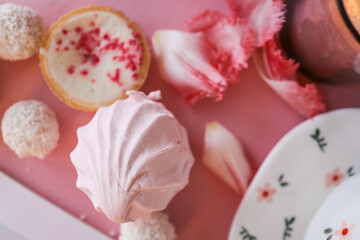 Mini marshmallows of white and light pink colors. Selective Focus. Flat lay.