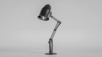 Modern black adjustable desk lamp with industrial design, isolated on neutral background. Ideal for home office, workspace, or studio lighting. Minimalist, functional, and stylish.