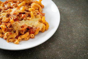 homemade macaroni bolognese with cheese