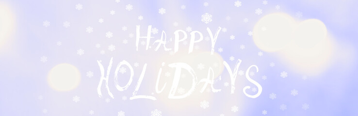 Happy Holidays saying, handwritten text. Snowflakes on soft blue background, light flares. Congratulating. Wide banner