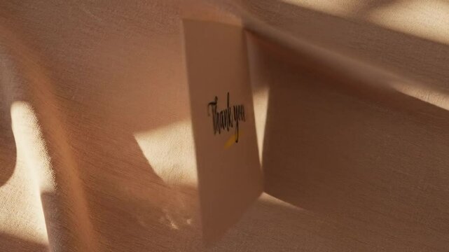 Abstract beige cloth and square paper