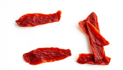 Fototapeta premium Neatly stacked slices of beef jerky on white background, slices, food