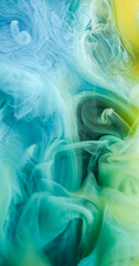 Art fog. Cloud dye. Colorful fume emulsion curl stream blending pigment. Green blue ink spill abstract fluid defocused background.