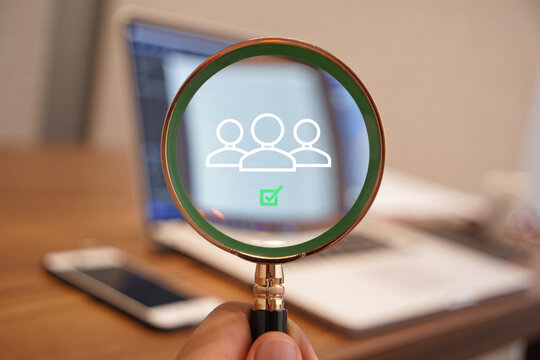 Team Selection Process Concept Magnifying Glass Showing Approved Team Members