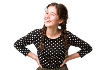Happy teenage girl with braided hair wearing polka dot shirt laughing with hands on hips isolated on transparent background