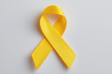 minimalistic image of single yellow ribbon on plain white background symbolizes hepatitis awareness and world hepatitis