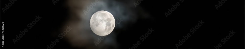 Aufkleber dramatic full moonrise with dense clouds in night sky for atmospheric digital media and creative bra