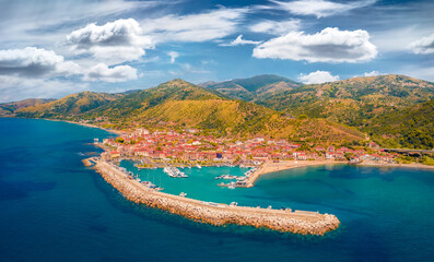 Incredible summer view from flying drone of Acciaroli port. Spectacular morning scene of Mediterraneanm coast of Italy, Europe. Traveling concept background.