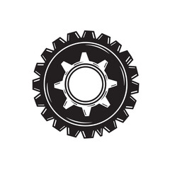 Black and white silhouette of a mechanical gear wheel illustrating technology machinery industrial engineering and business concept