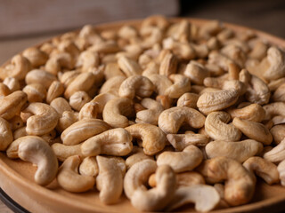 Full frame Cashew nuts background. Vegetarian Organic Healthy snack concept.
