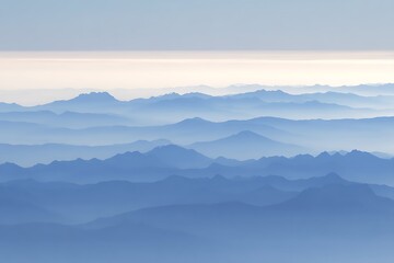 Blue mountain range shrouded in mist