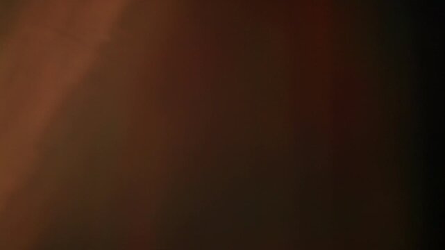 Shimmering light leaks overlay footage with glowing bokeh, vibrant beams, and radiant exposure transitions