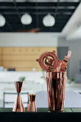 bartender's utensil and 2 jigger