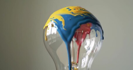 Paint Dripping Down a Light Bulb Close-Up - Abstract Art - Powered by Adobe