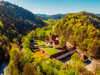 Medieval monastery Cerveny Klastor near Peak Tri Koruny or Trzy Korony in Pieniny National park in Slovakia and Poland