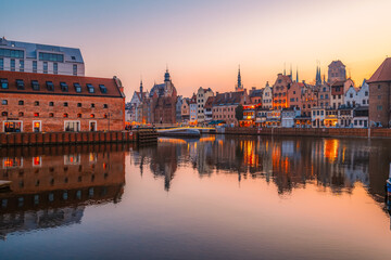 Gdansk with Motlawa river in Poland. Old town colourful house with Zuraw or crane and with Holy Spirit Gate © Zedspider