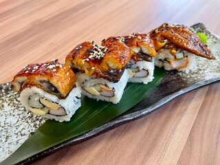 Unagi sushi rolls. Grilled Japanese eel sushi rolls. Famous delicious Japanese food. Close up