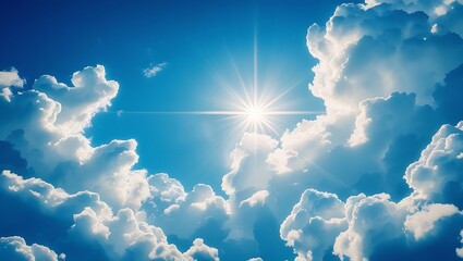 Radiant sun bursts through fluffy white clouds in a vibrant blue sky