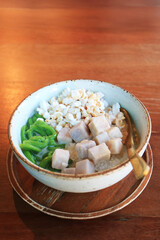 Iced Sweet and Fragrance Lod Chong Pandan Noodles in Coconut Milk Topped with Taro and Puffed Rice