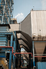 Naklejka premium Vast Industrial Plant with Blue Structures