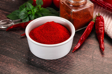 Spicy dry paprika powder in the bowl