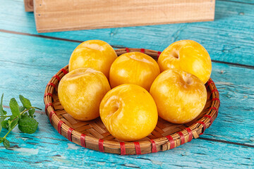Raw ripe sweet yellow plums