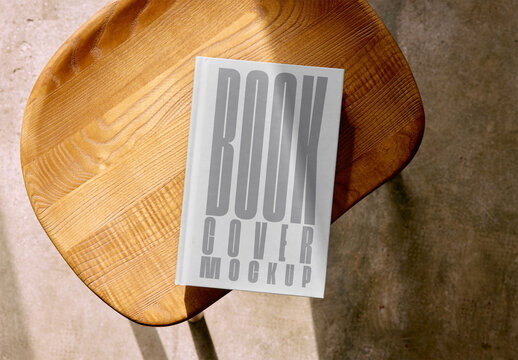 Mockup Of Hard Back Book On Stool, Customizable