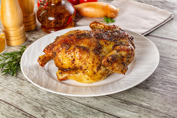 Baked in oven whole chicken with spices