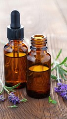 Amber Bottles Lavender Essential Oil Wooden Table lavender oil