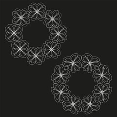 Star pattern vector. Circular symmetry shape. Floral black background. White glowing style.