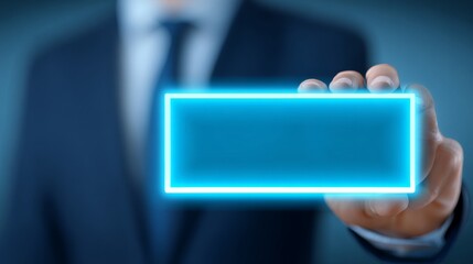 A businessman holding a glowing rectangular frame, symbolizing innovation and ideas.