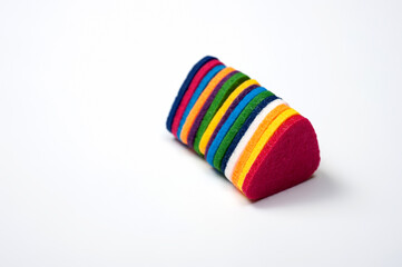 Felt picks in different colors for playing the ukulele or other string instruments.