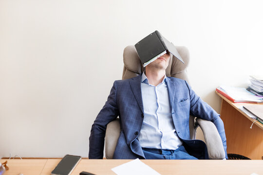 Small business owner experiences financial crisis, high costs, bank debt, money overspend concept. Man sitting at desk looks at laptop screen holding receipt feels desperate after calculating expenses