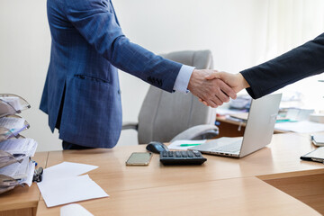 Business handshake for teamwork of business merger and acquisition,successful negotiate,hand...