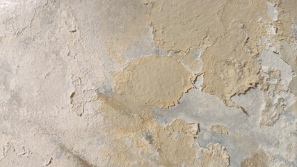 Weathered horizontal paint crack on an old concrete wall, showing signs of time, texture decay, rough surface and vintage charm, great for urban backgrounds and aged architecture themes.
