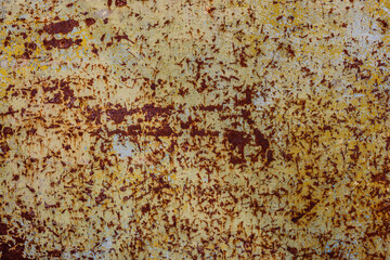 Rusty metal surface with paint chipping in - full-frame background and texture