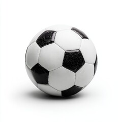 Obraz premium Classic black and white soccer ball, slightly textured surface, isolated on white background, casts a small shadow