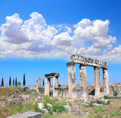Columns and ruin of ancient building on Frontinus street in ancient Hierapolis, Pamukkale,...