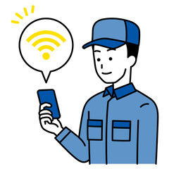 Wi-Fiに繋がっているスマートフォンを持つつなぎ作業服の男性