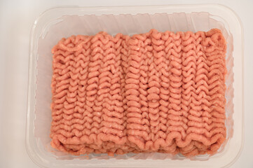 Minced meat in plastic packaging from the butcher shop,