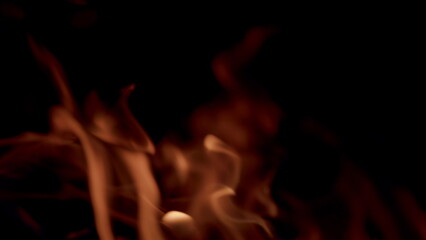 Beautiful flames dance gracefully against a dark background, creating a stunning visual