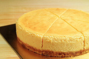 Closeup of delectable whole baked cheesecake