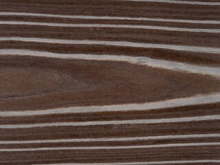Crown bark veneer surface showcasing rich walnut and soft beige in a natural striped pattern