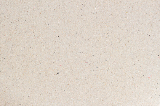 Recycled paper background with soft fibers and subtle specks in light tone. Eco-friendly neutral texture for natural designs. Concept of recycling, minimal style, raw paper surface