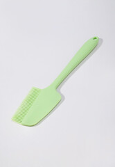 green plastic spatula