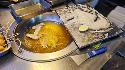 Delicious traditional Taiwanese night market snack — freshly fried handmade sailfish eggrolls from Donggang, Pingtung. Seafood paste ingredients, deep-frying preparation process