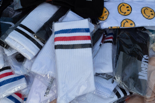 Close up of various new socks in plastic at Mataram, Lombok, Indonesia - September 1, 2024